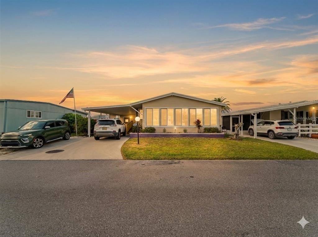 154 Rarotonga Road North Port, FL 34287 - Photo 46 of 47 a swimming pool view with a car parked in front of it