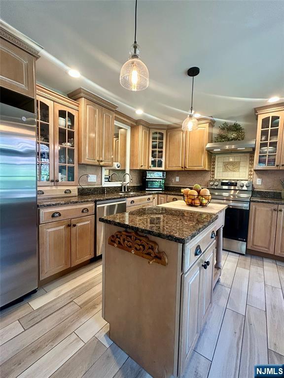 157 West Glen Road Denville, NJ 07834 - Photo 11 of 45 a kitchen with stainless steel appliances granite countertop a stove a sink dishwasher and a refrigerator