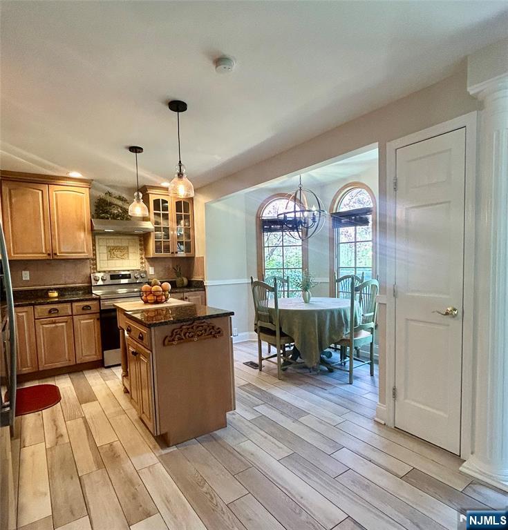 157 West Glen Road Denville, NJ 07834 - Photo 12 of 45 a kitchen with stainless steel appliances granite countertop a stove and a refrigerator