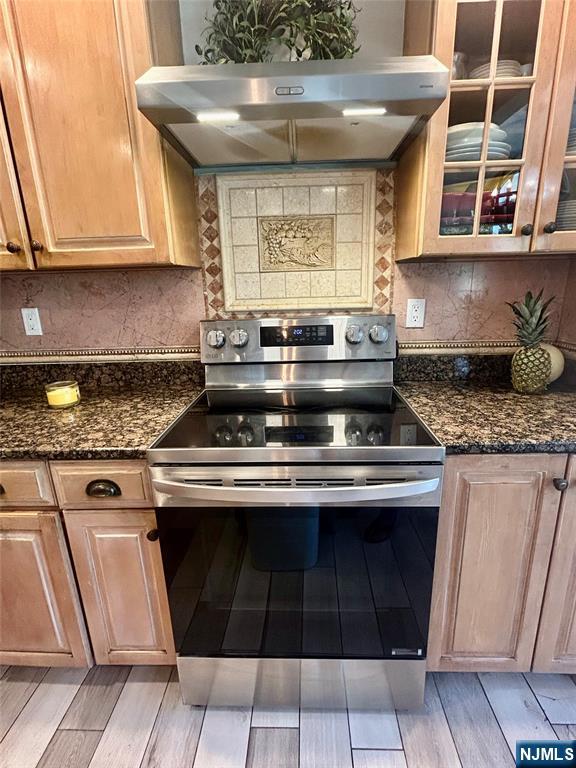 157 West Glen Road Denville, NJ 07834 - Photo 14 of 45 a kitchen with granite countertop a stove a sink and a cabinets