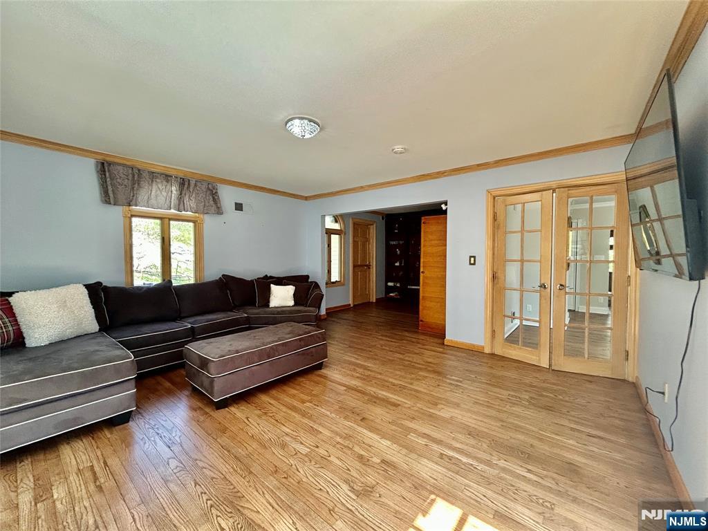 157 West Glen Road Denville, NJ 07834 - Photo 20 of 45 a living room with furniture and a wooden floor