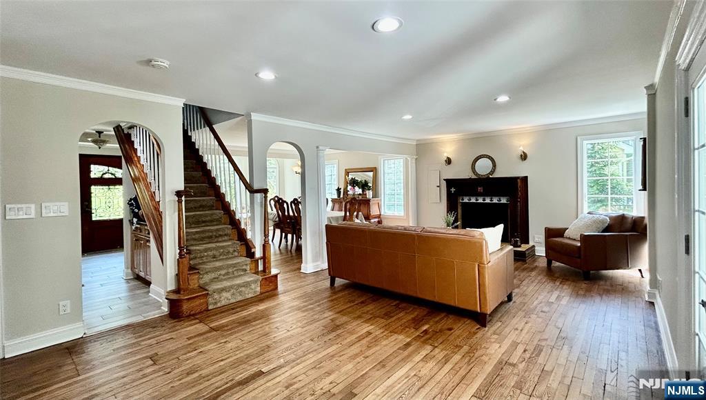 157 West Glen Road Denville, NJ 07834 - Photo 24 of 45 a living room with furniture and a fireplace