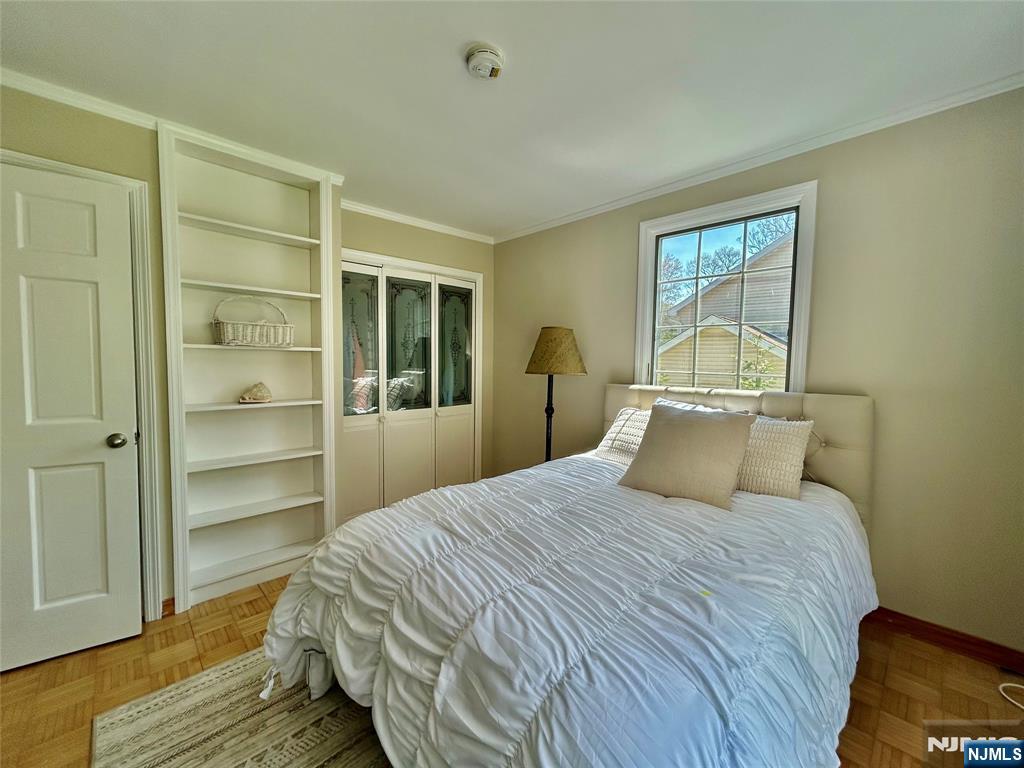 157 West Glen Road Denville, NJ 07834 - Photo 34 of 45 a bedroom with a bed and a window