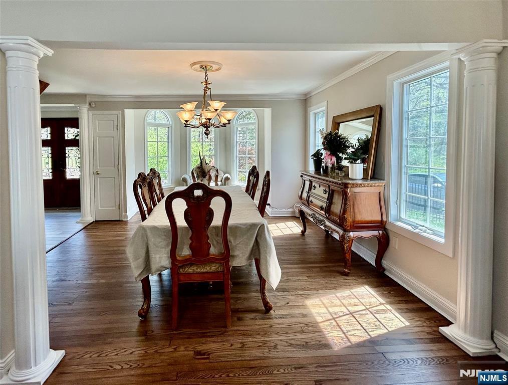 157 West Glen Road Denville, NJ 07834 - Photo 6 of 45 a dining room with furniture a chandelier and wooden floor