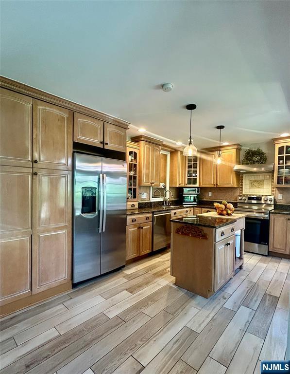 157 West Glen Road Denville, NJ 07834 - Photo 10 of 45 a large kitchen with a large counter top stainless steel appliances and cabinets