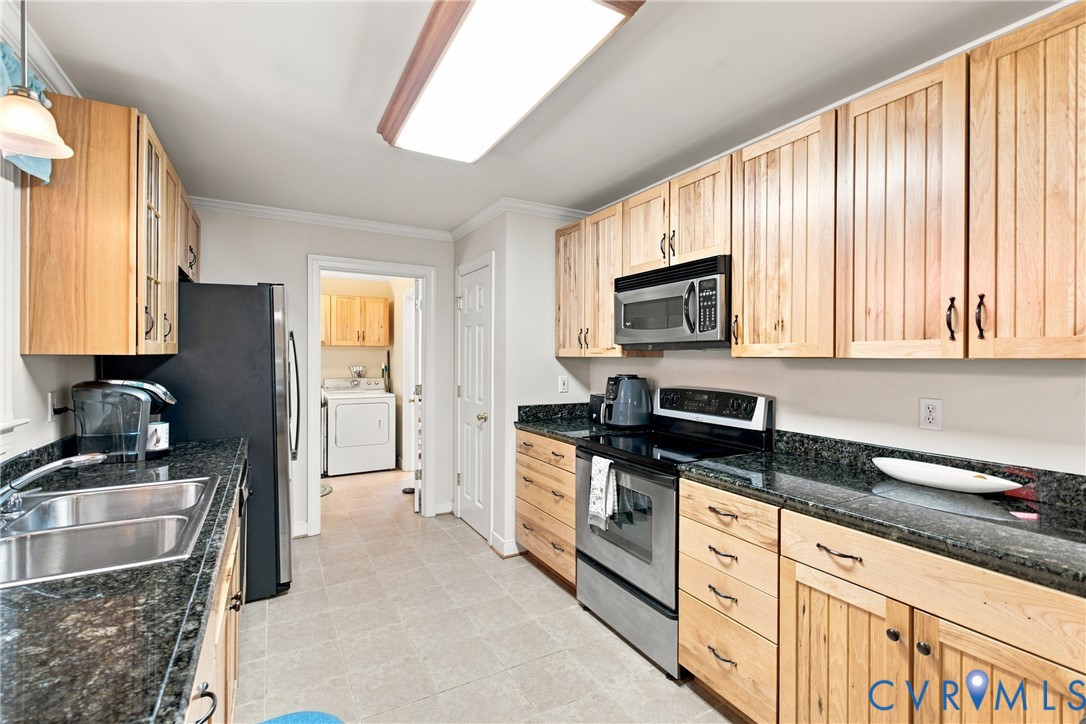 197 Goshen Road Cumberland, VA 23040 - Photo 13 of 70 Kitchen featuring light wood cabinetry, dark grani