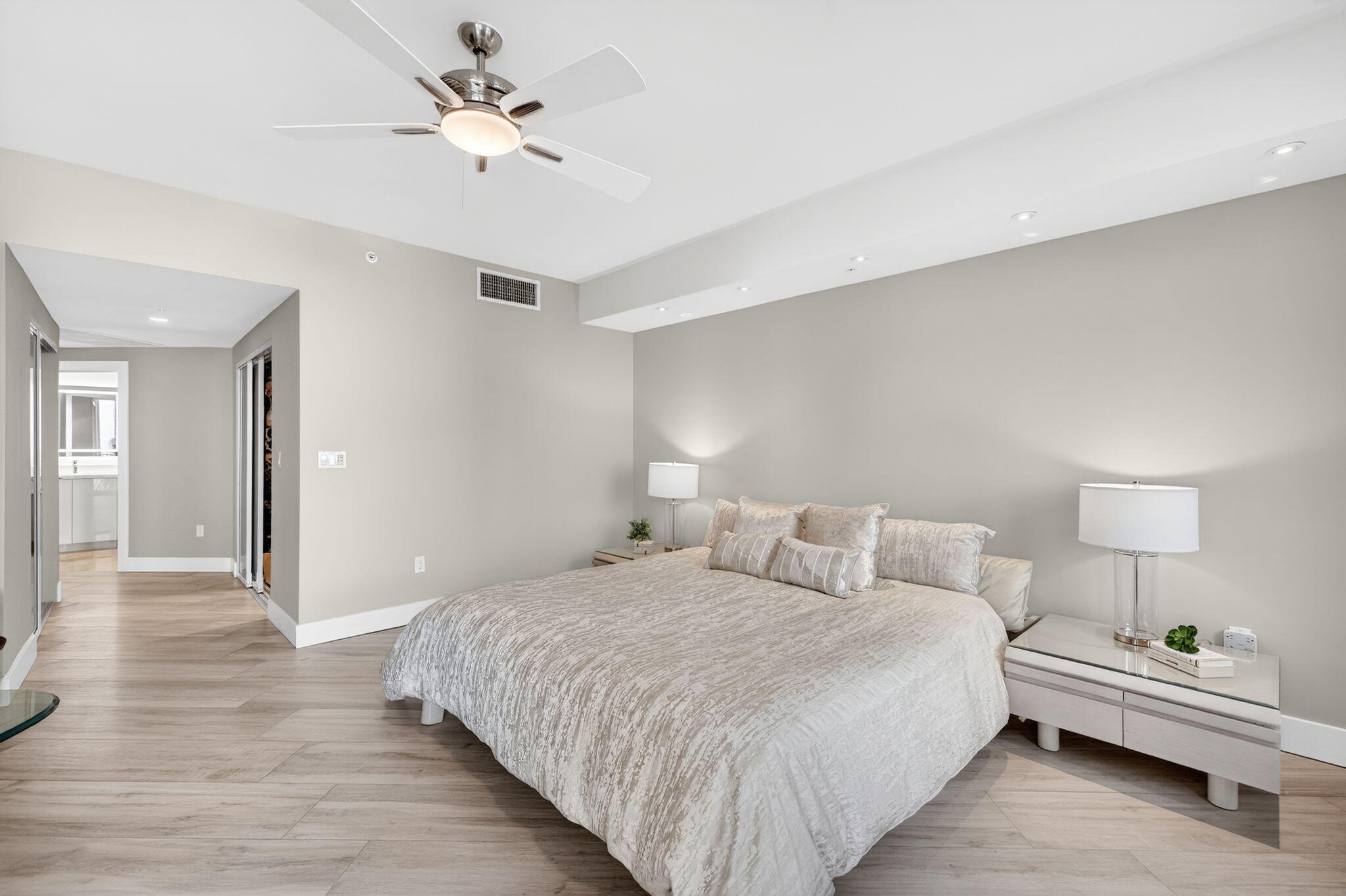 100 South Birch Road, Unit 803 Fort Lauderdale, FL 33316 - Photo 24 of 57 a bedroom with a bed chandelier and a window