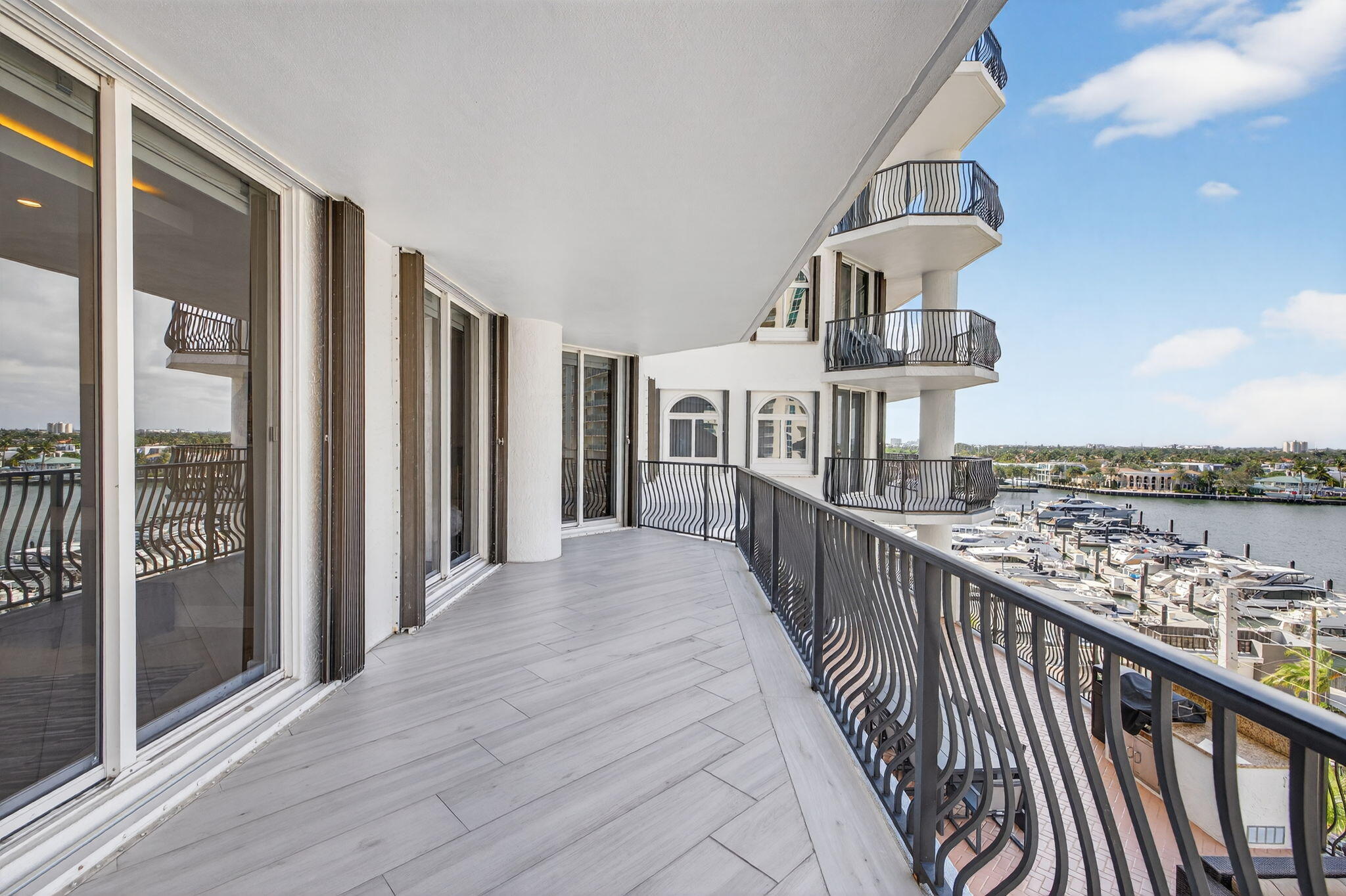 100 South Birch Road, Unit 803 Fort Lauderdale, FL 33316 - Photo 38 of 57 a view of a balcony with wooden floor
