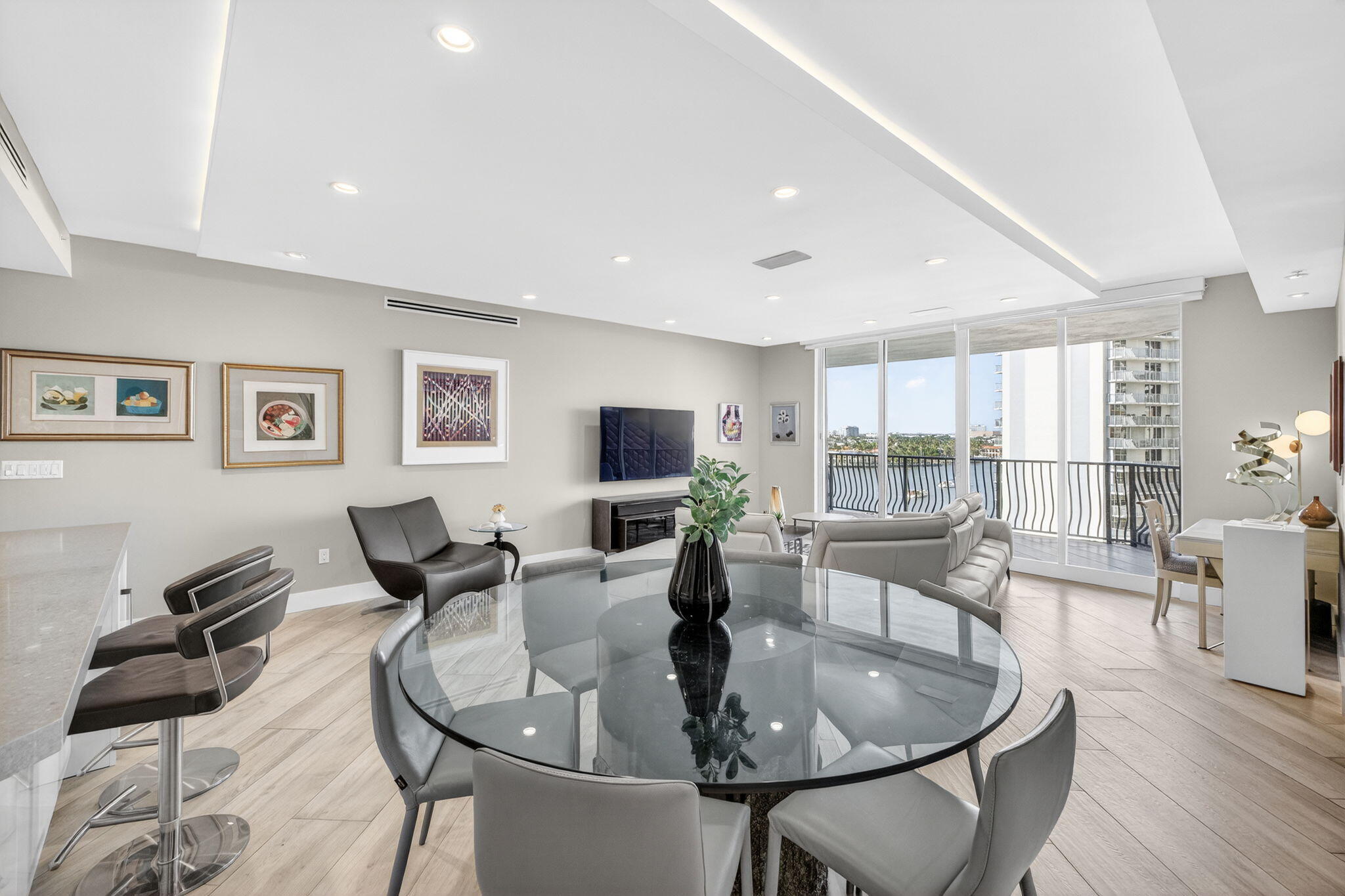 100 South Birch Road, Unit 803 Fort Lauderdale, FL 33316 - Photo 5 of 57 a living room with furniture and wooden floor