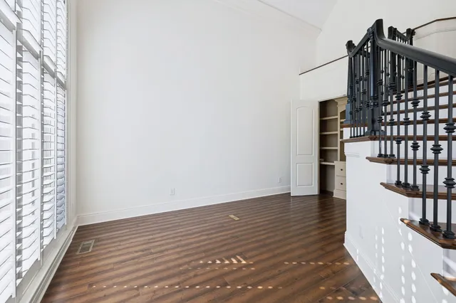 a view of an entryway with wooden floor
