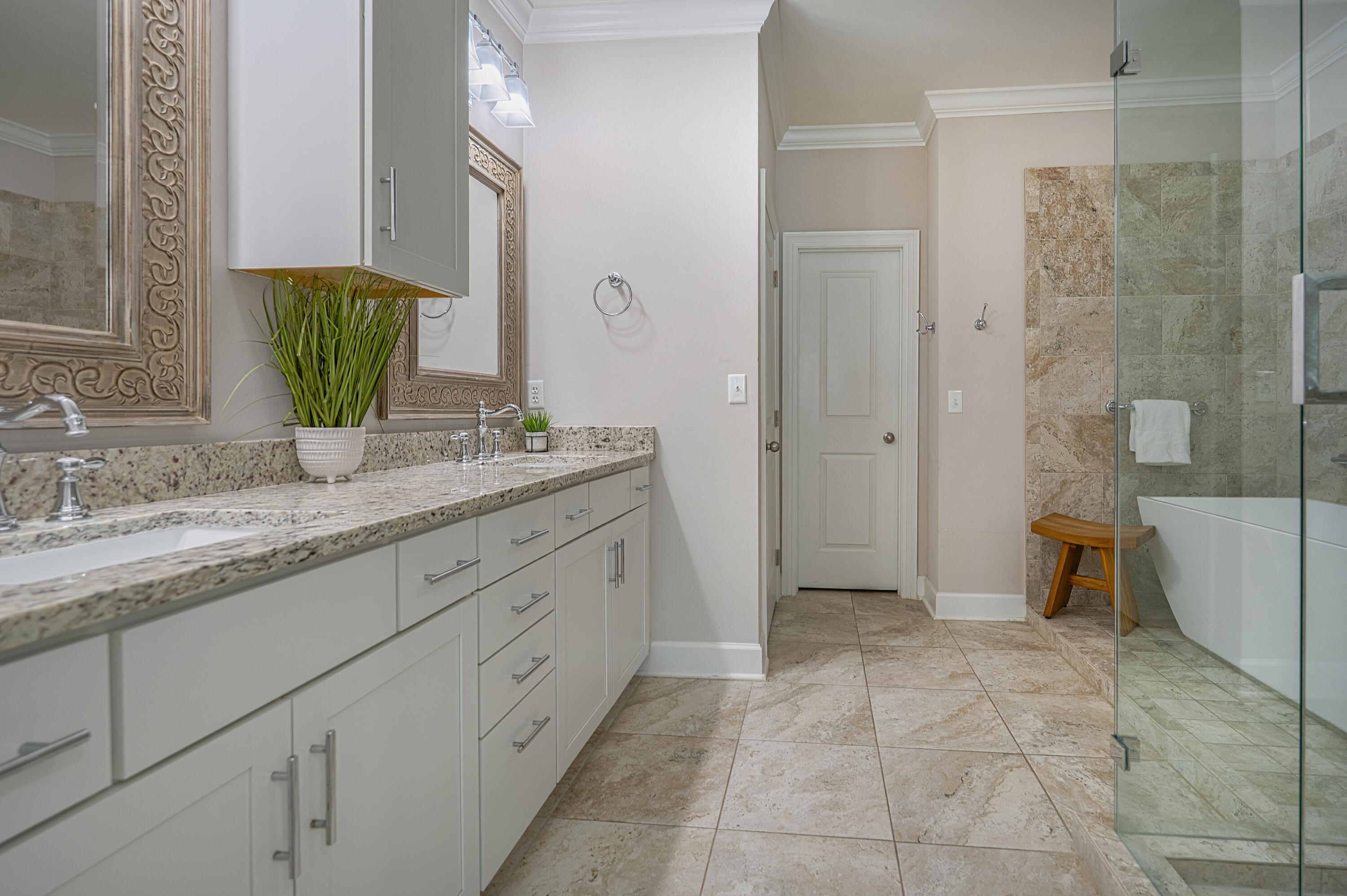257 Driftwood Road, Unit 1 Miramar Beach, FL 32550 - Photo 12 of 36 a bathroom with a granite countertop sink a toilet and a shower