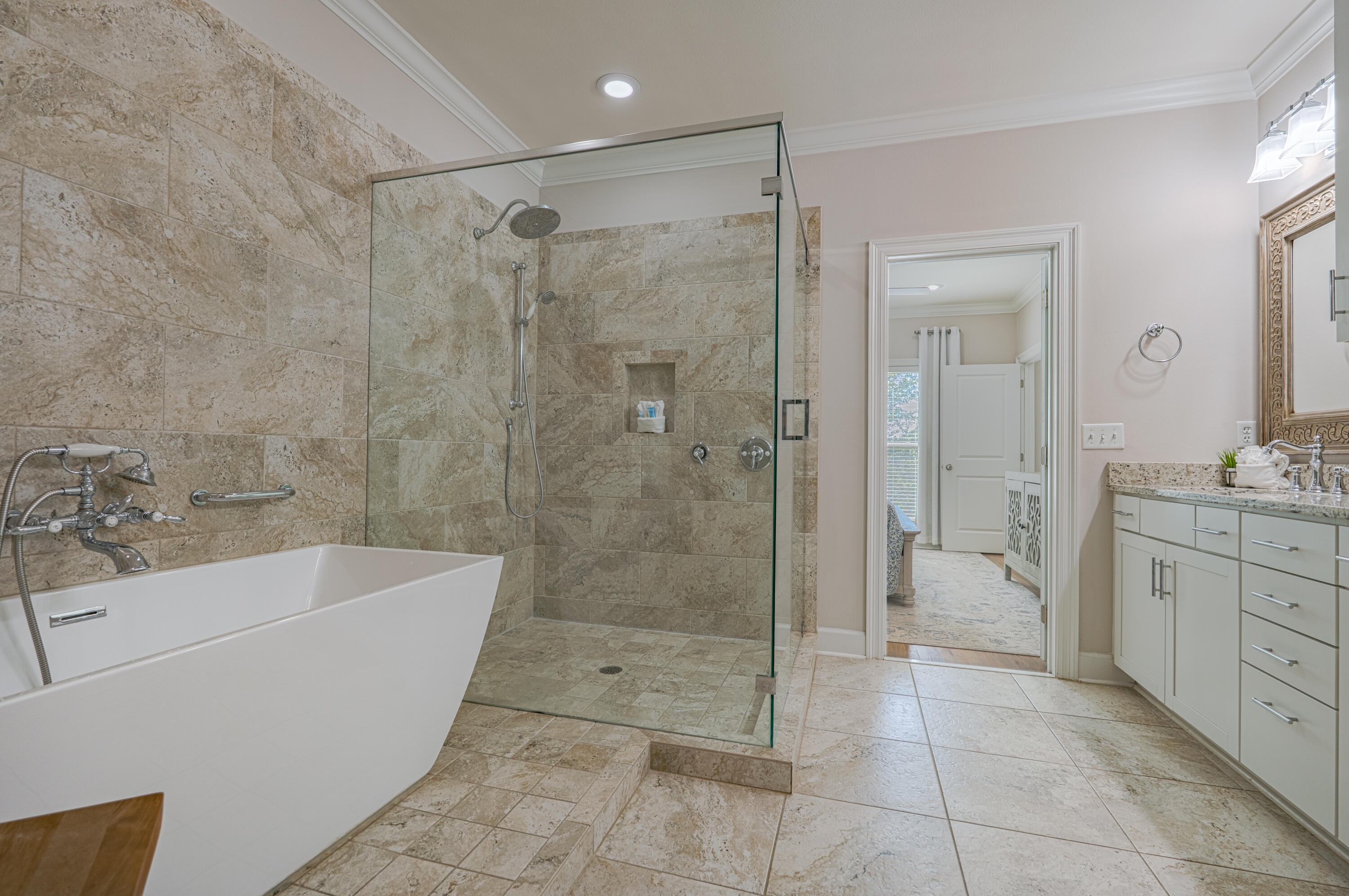 257 Driftwood Road, Unit 1 Miramar Beach, FL 32550 - Photo 14 of 36 a bathroom with a granite countertop sink a toilet and shower