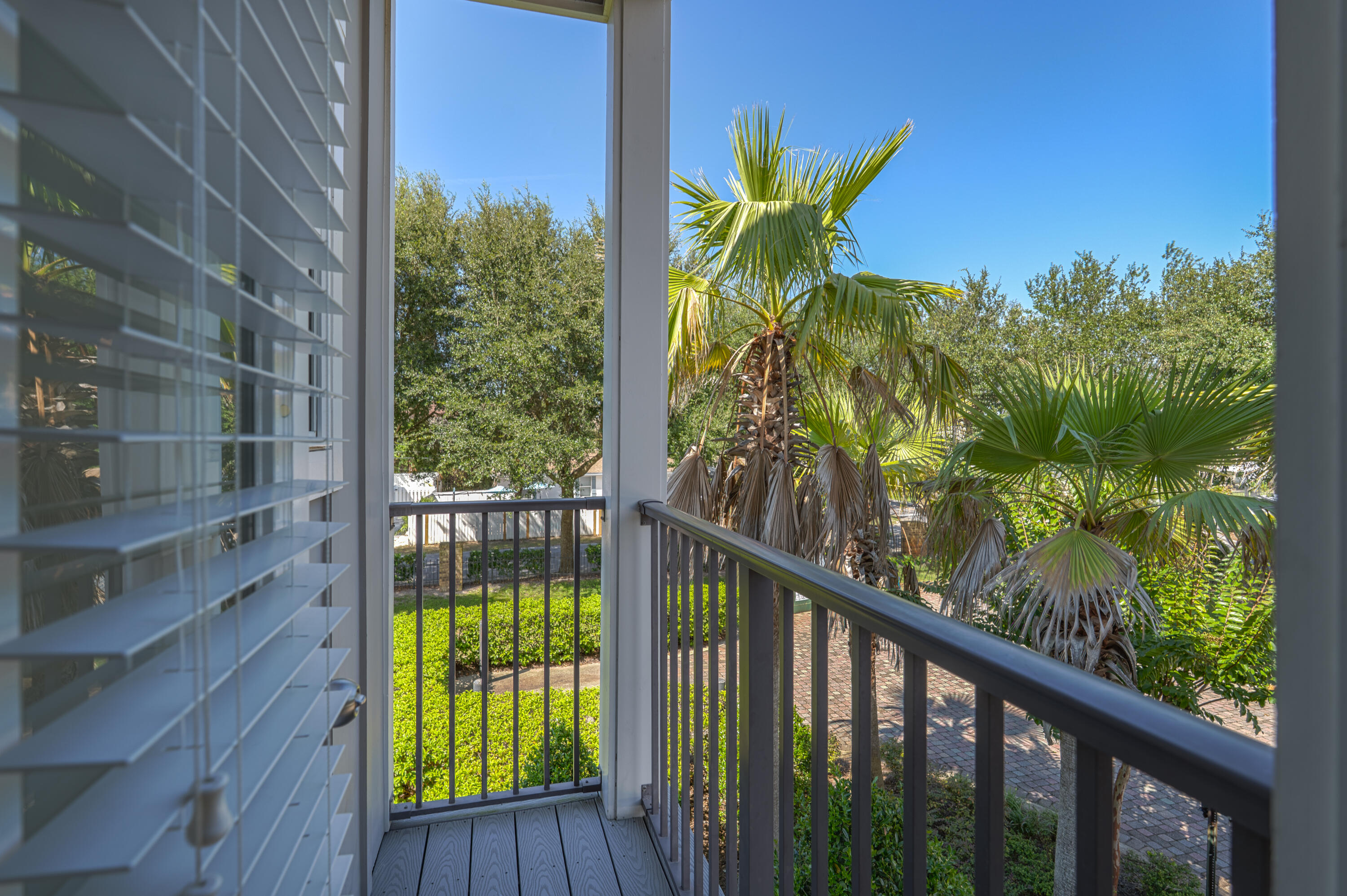 257 Driftwood Road, Unit 1 Miramar Beach, FL 32550 - Photo 22 of 36 a view of a garden from a balcony