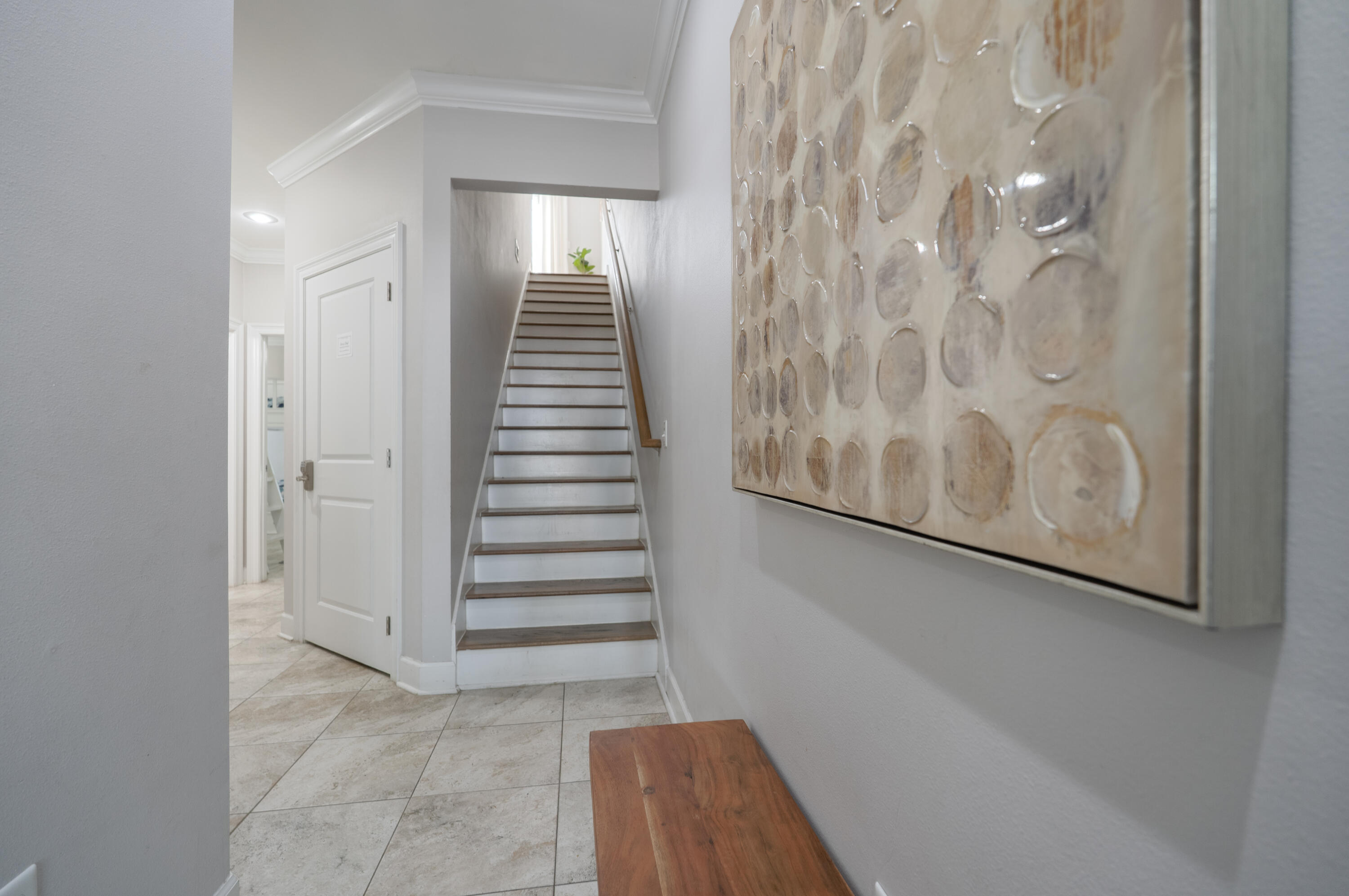257 Driftwood Road, Unit 1 Miramar Beach, FL 32550 - Photo 25 of 36 a view of a hallway with stairs