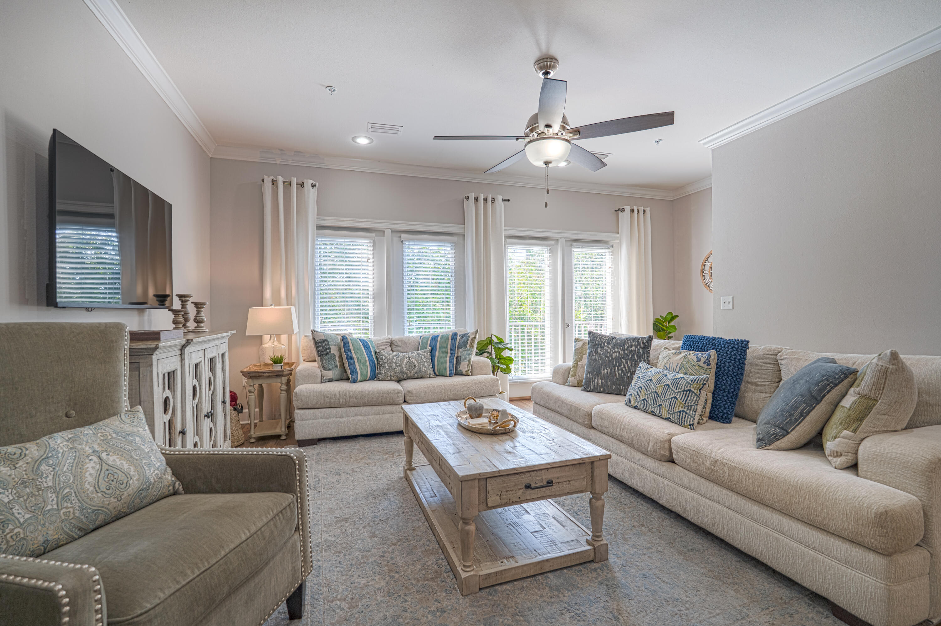 257 Driftwood Road, Unit 1 Miramar Beach, FL 32550 - Photo 3 of 36 a living room with furniture and a large window