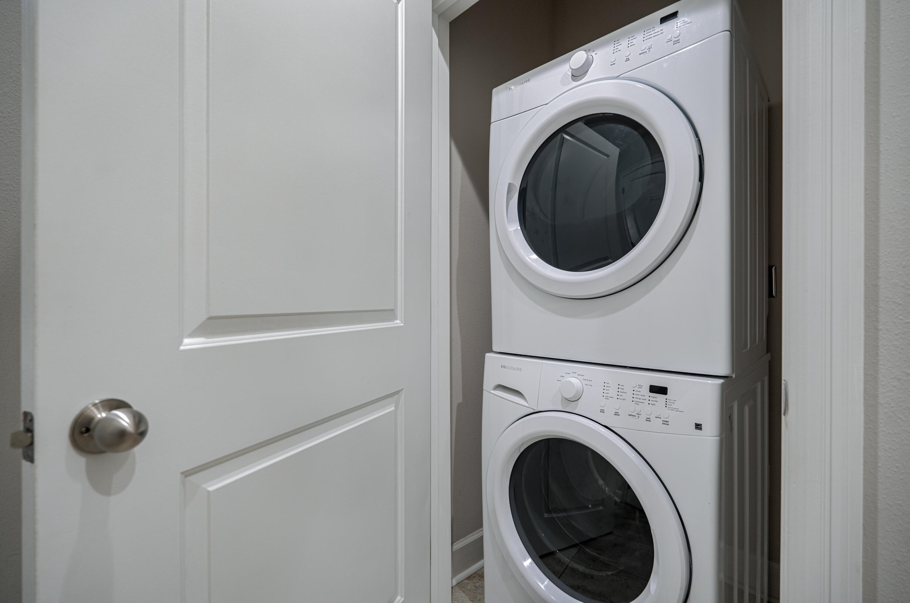 257 Driftwood Road, Unit 1 Miramar Beach, FL 32550 - Photo 31 of 36 a close up view of a washer and dryer