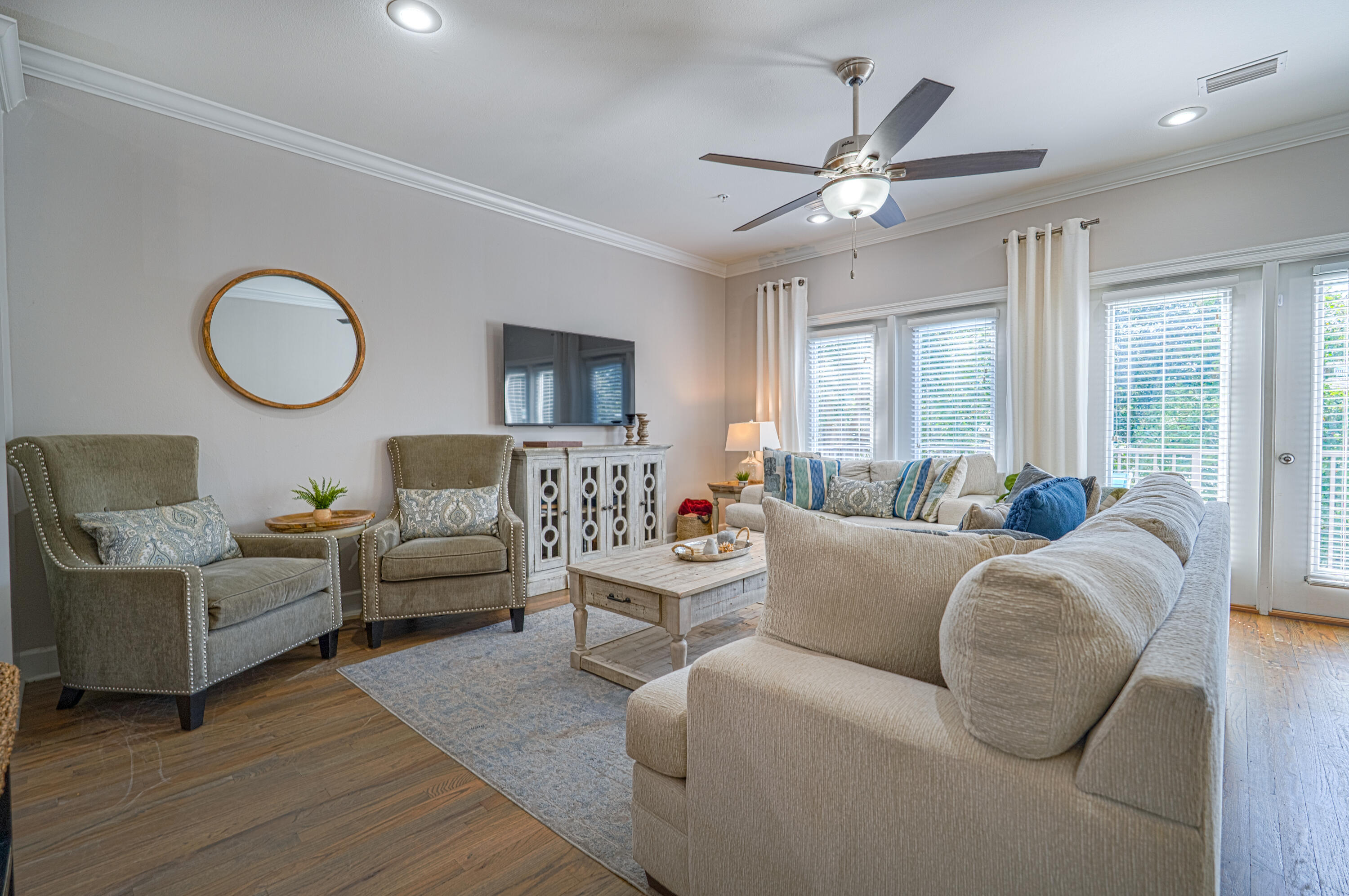257 Driftwood Road, Unit 1 Miramar Beach, FL 32550 - Photo 4 of 36 a living room with furniture and a large window
