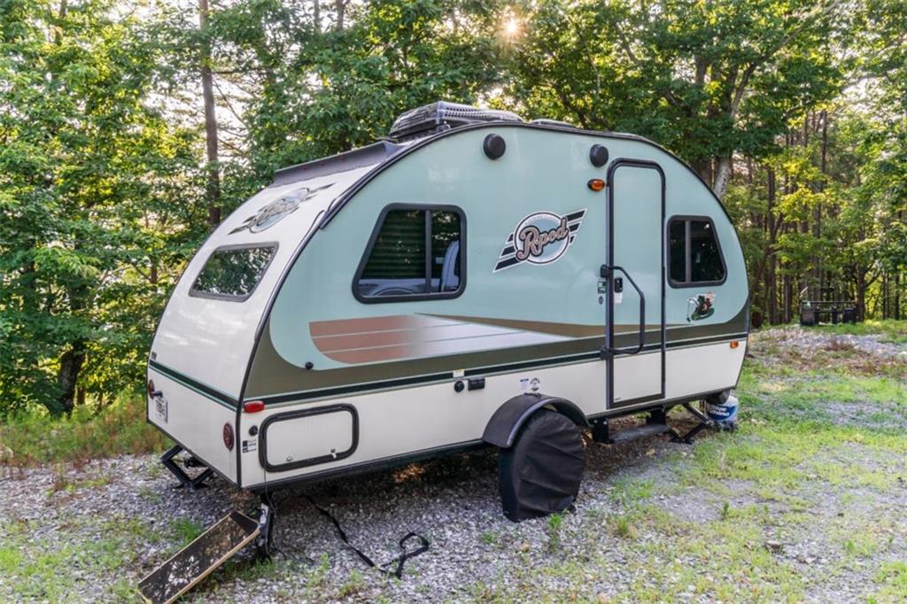 2400 Shinbone Ridge Road LaFayette, GA 30728 - Photo 15 of 29 a front view of a house with garden
