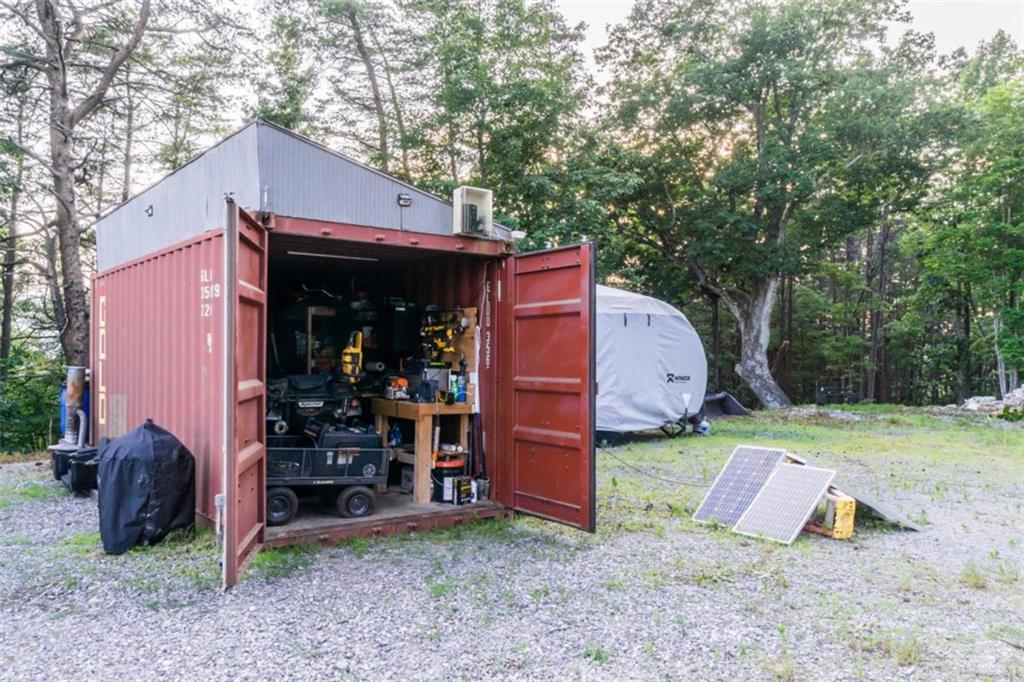 2400 Shinbone Ridge Road LaFayette, GA 30728 - Photo 18 of 29 a view of a house with a yard and a large tree