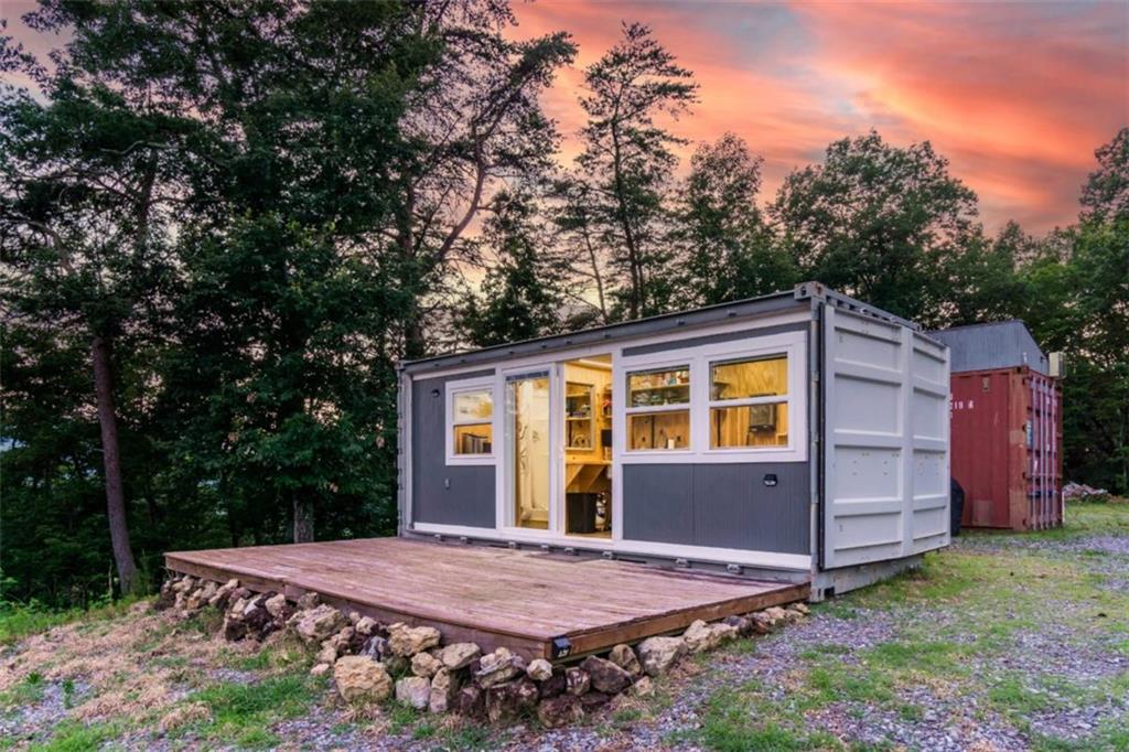 2400 Shinbone Ridge Road LaFayette, GA 30728 - Photo 20 of 29 a view of a house with backyard and trees
