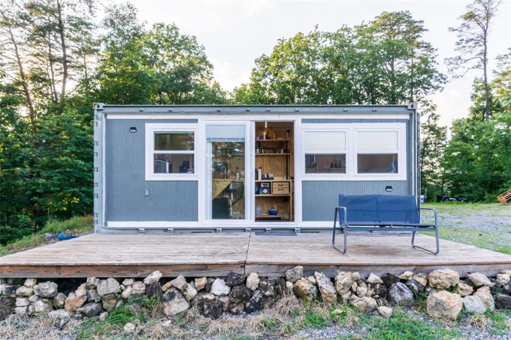 2400 Shinbone Ridge Road LaFayette, GA 30728 - Photo 2 of 29 front view of a house with a yard