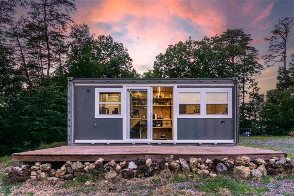 2400 Shinbone Ridge Road LaFayette, GA 30728 - Photo 21 of 29 front view of a house with a yard