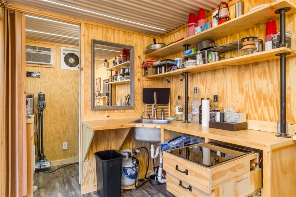 2400 Shinbone Ridge Road LaFayette, GA 30728 - Photo 3 of 29 a kitchen that has a lot of cabinets in it