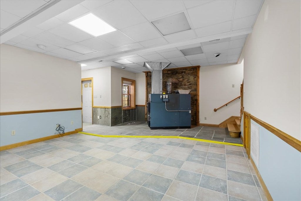 3095 State Shed Road Nathalie, VA 24577 - Photo 53 of 90 Living room 22.79 x 16.28, Basement apartment
Wood heater