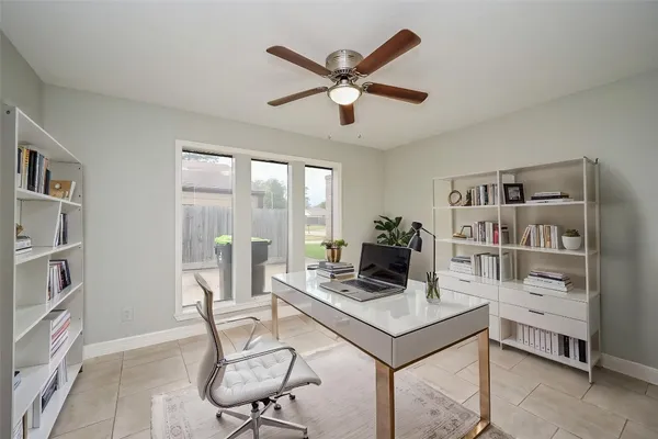 a view of a kitchen with a sink and cabinets