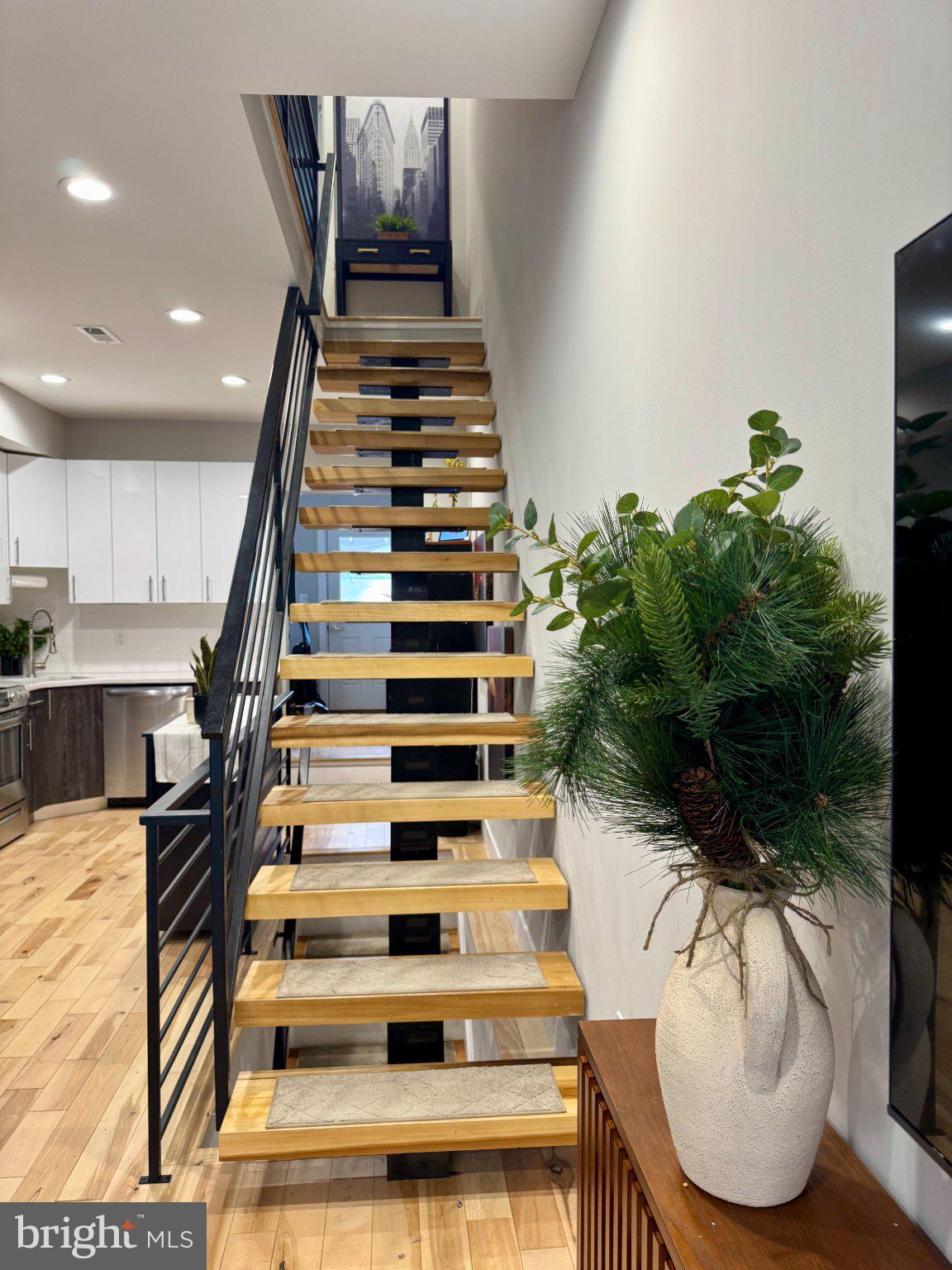 1217 LeCount Street Philadelphia, PA 19121 - Photo 16 of 29 Modern staircase with natural accents.