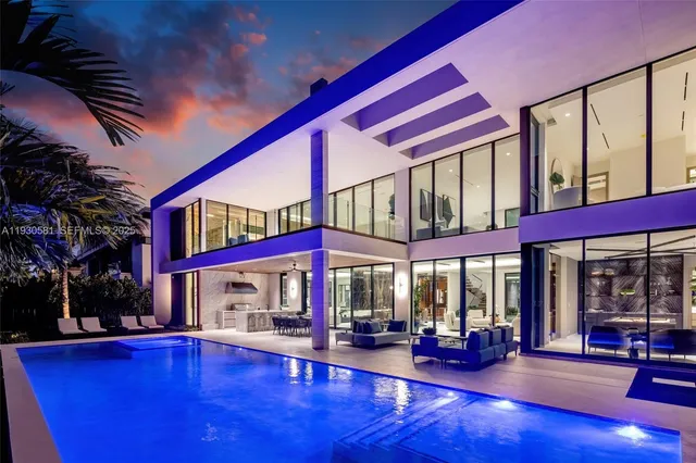 a view of a swimming pool with lounge chair