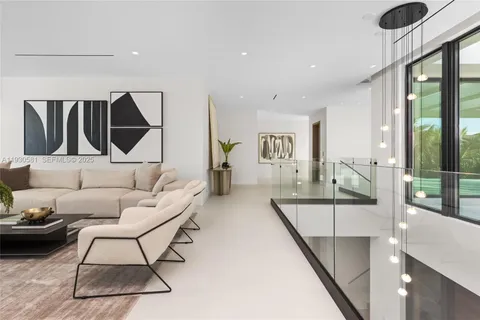 a balcony with furniture and a view of city