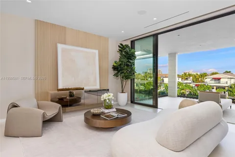 a bedroom with a bed and a cabinet