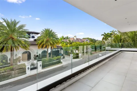 a view of yard with swimming pool and patio
