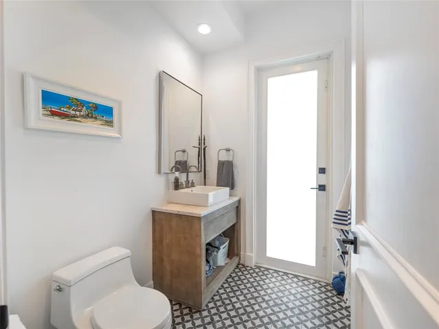 a view of a living room and entryway with wooden floor