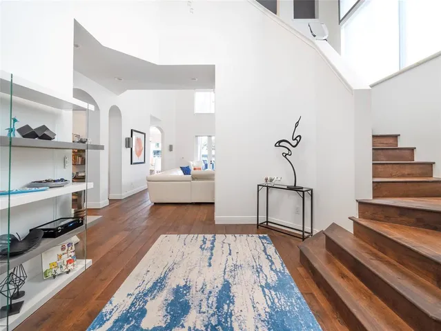 a room with windows and chandelier