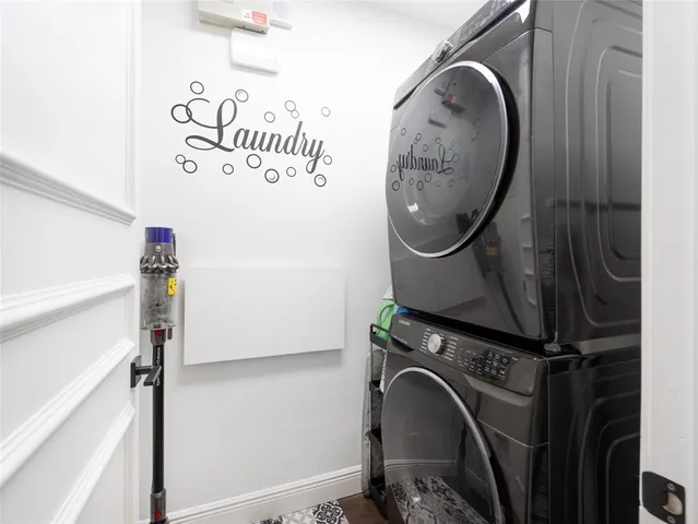 a view of street with a building and trees in the background