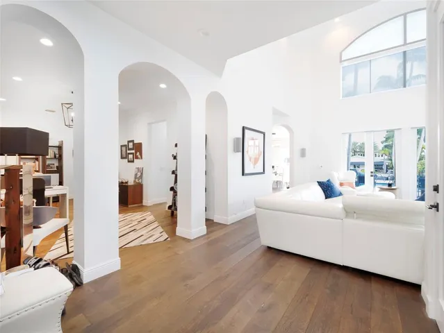 a workspace with furniture and wooden floor