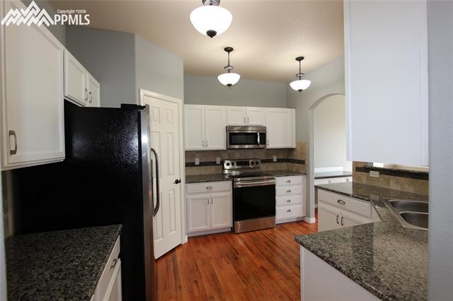 6895 Red Cardinal Loop Colorado Springs, CO 80908 - Photo 5 of 30 Gallery Image 5