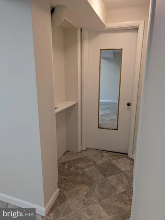 a bathroom with a sink and mirror