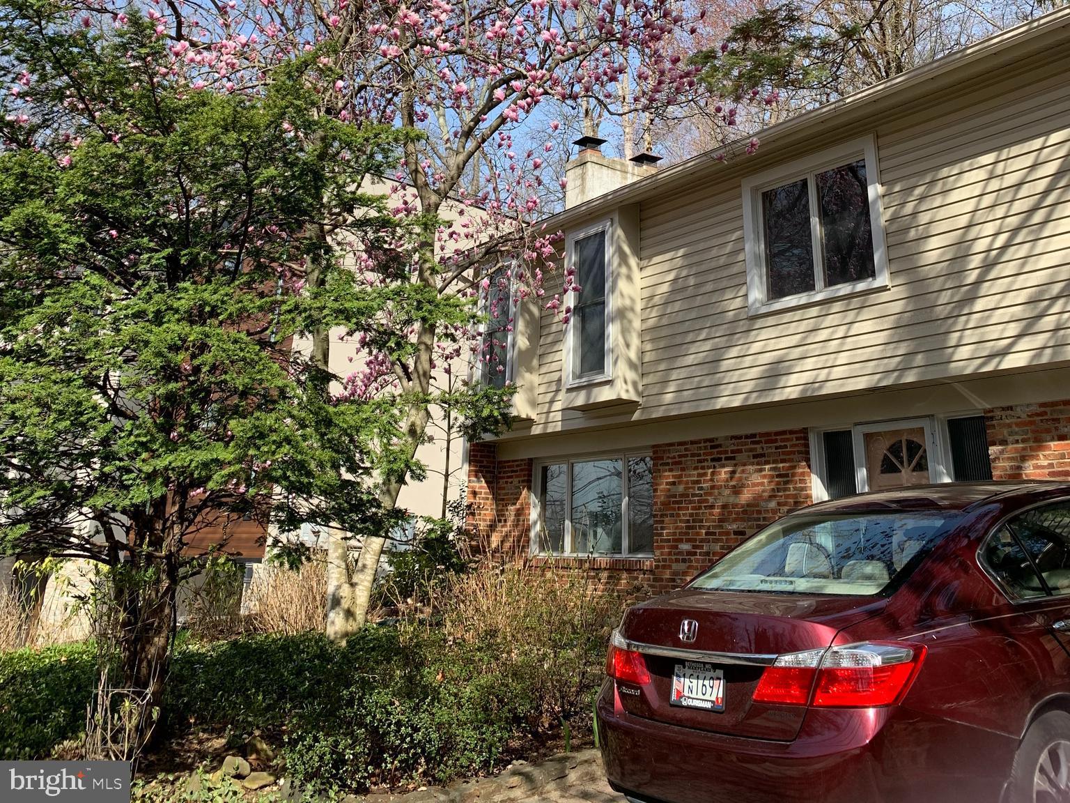 6705 Goldsboro Road Bethesda, MD 20817 - Photo 2 of 60 a car parked in front of a house