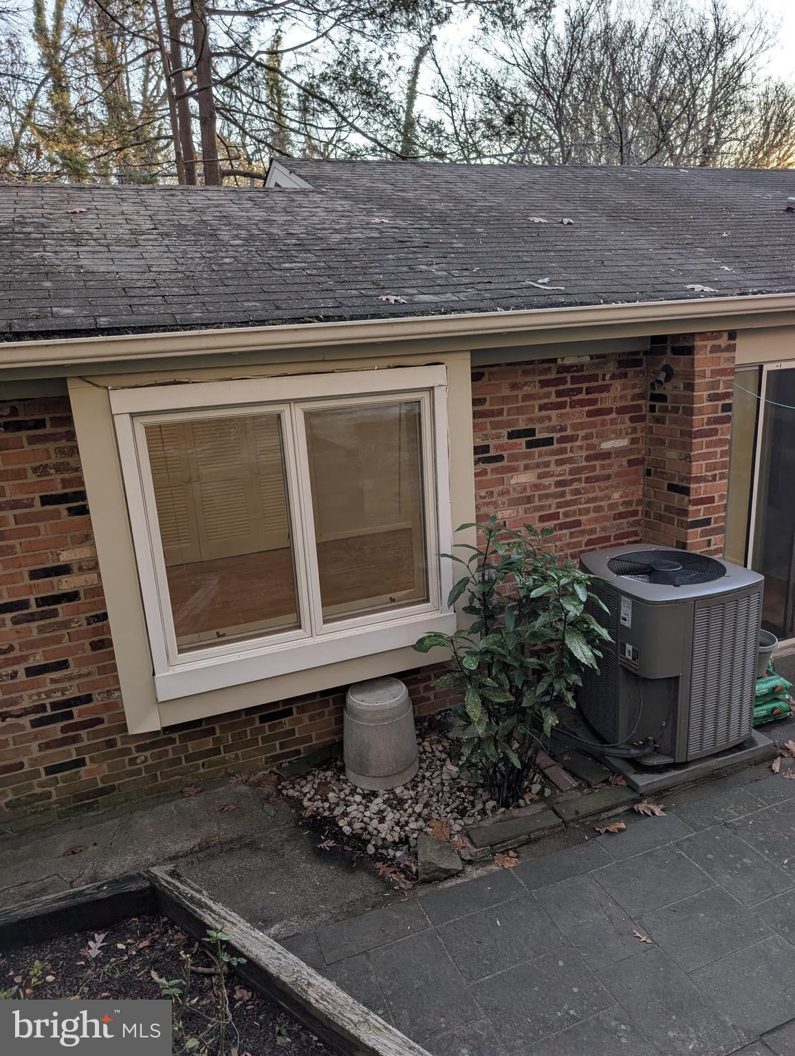 6705 Goldsboro Road Bethesda, MD 20817 - Photo 55 of 60 a front view of a house with garden