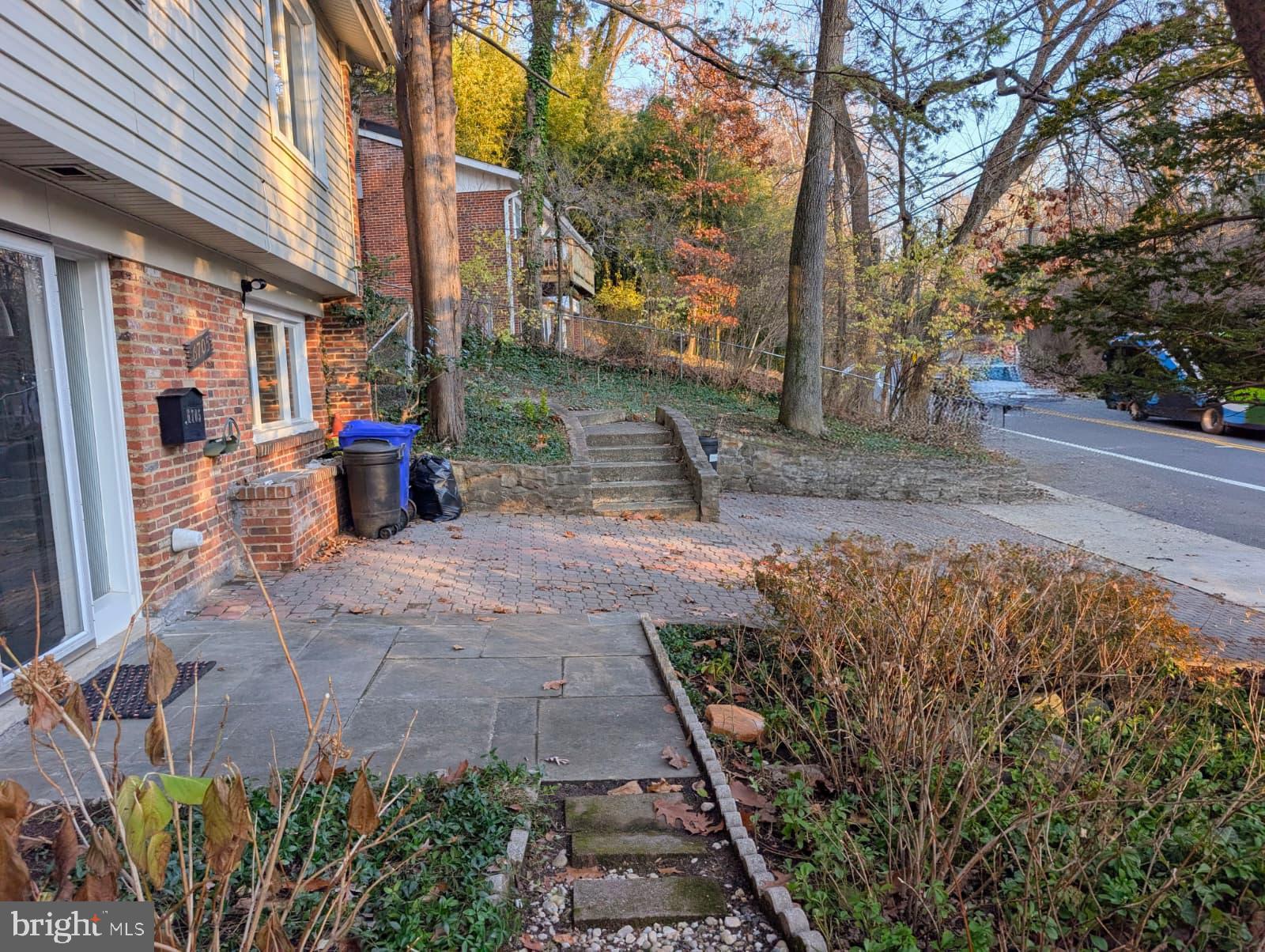 6705 Goldsboro Road Bethesda, MD 20817 - Photo 7 of 60 a view of a backyard with sitting area