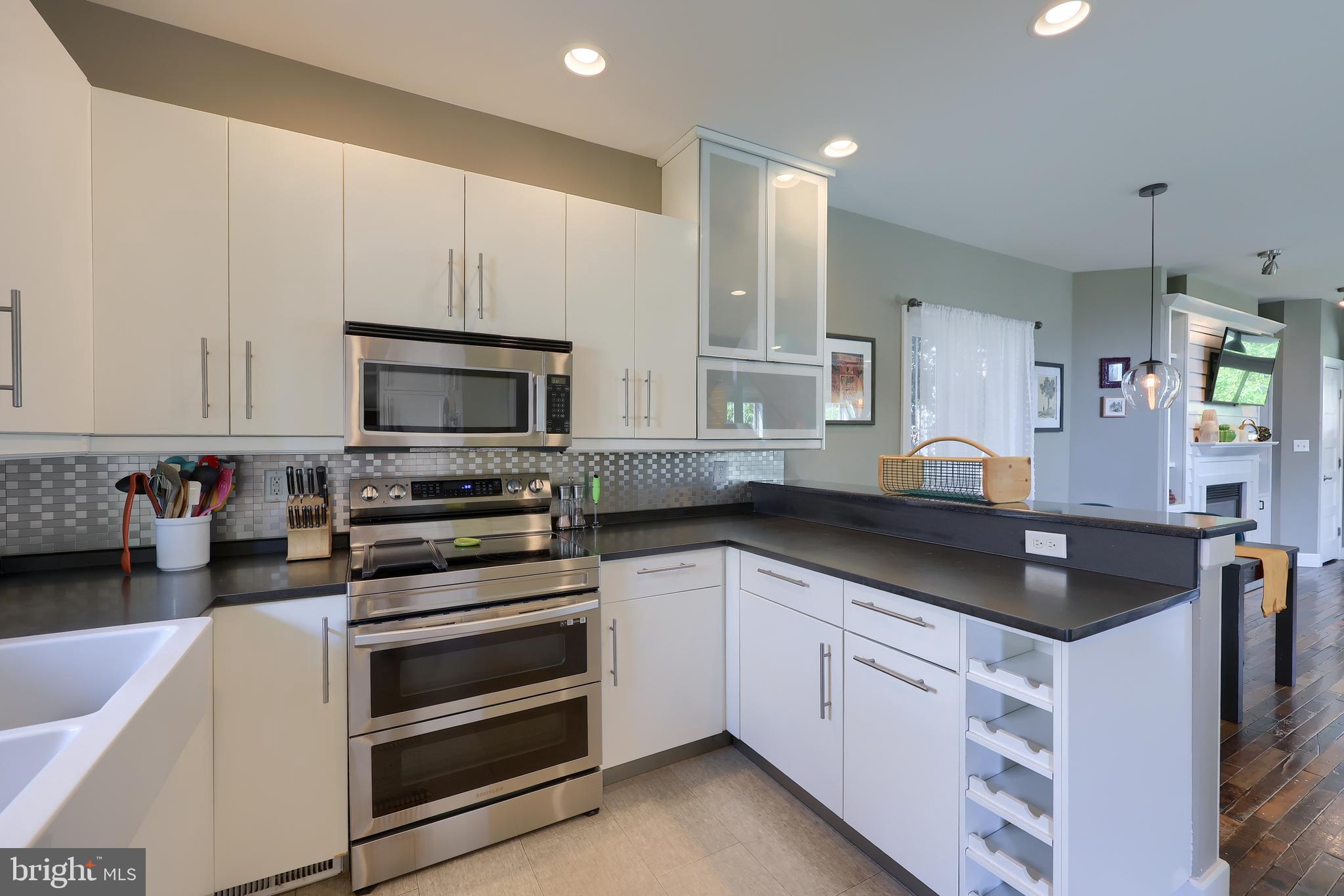 356 North Broad Street Lititz, PA 17543 - Photo 14 of 53 a kitchen with white cabinets and appliances