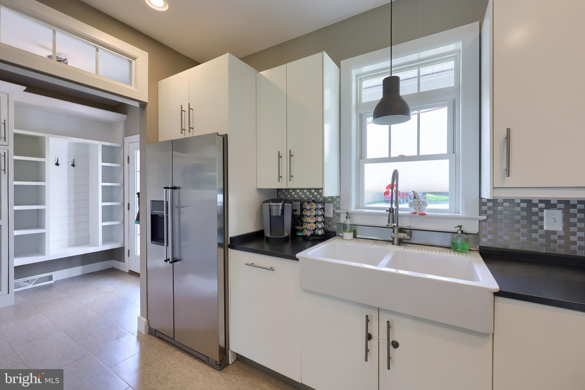 356 North Broad Street Lititz, PA 17543 - Photo 16 of 53 a kitchen with a sink refrigerator and cabinets