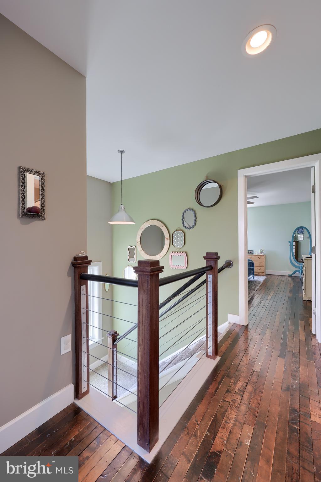 356 North Broad Street Lititz, PA 17543 - Photo 22 of 53 a view of a hallway with wooden floor and staircase