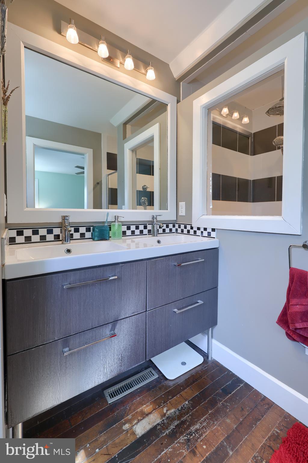 356 North Broad Street Lititz, PA 17543 - Photo 25 of 53 a bathroom with a sink and a mirror