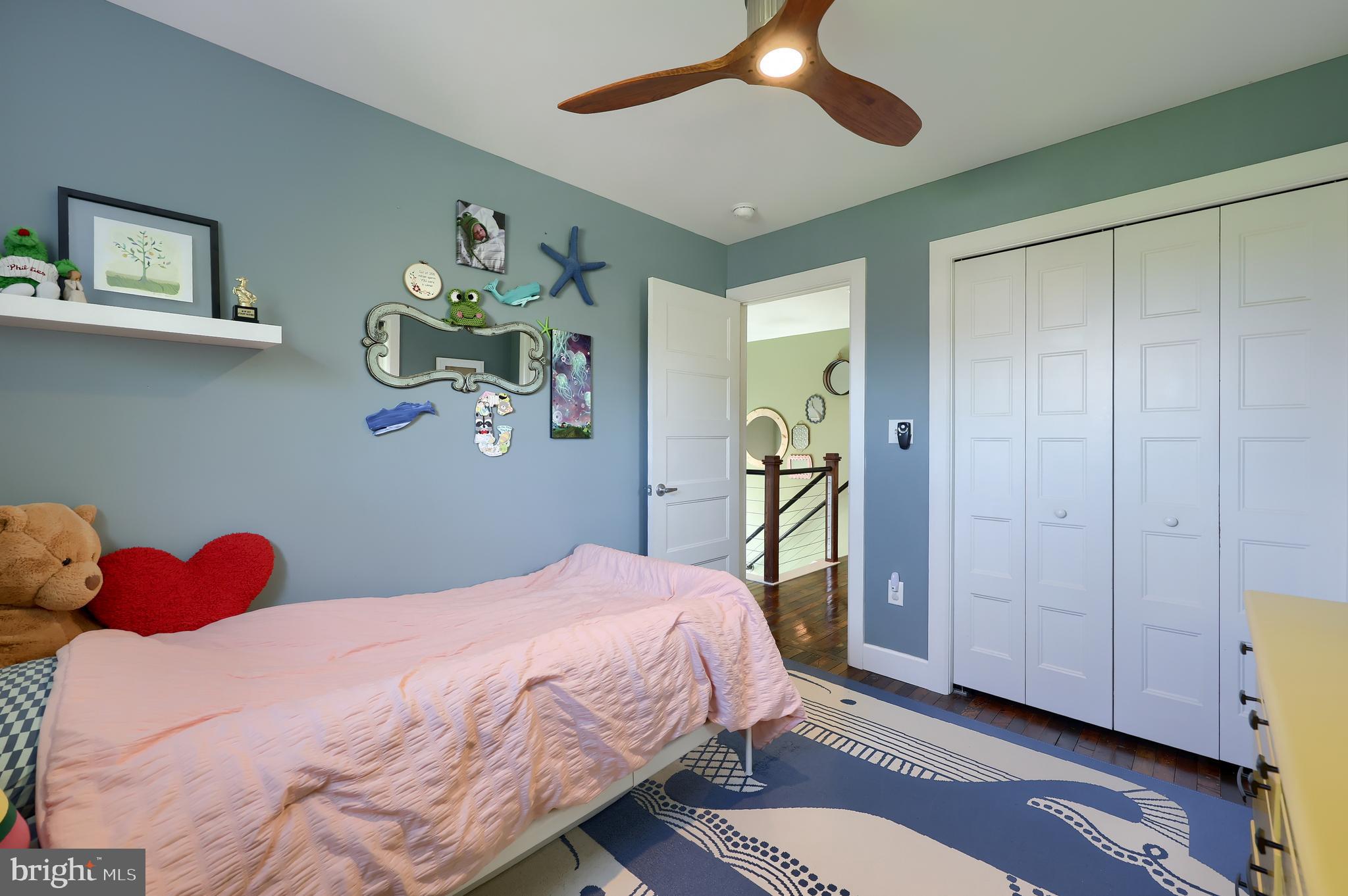 356 North Broad Street Lititz, PA 17543 - Photo 29 of 53 a bedroom with a bed and a chandelier