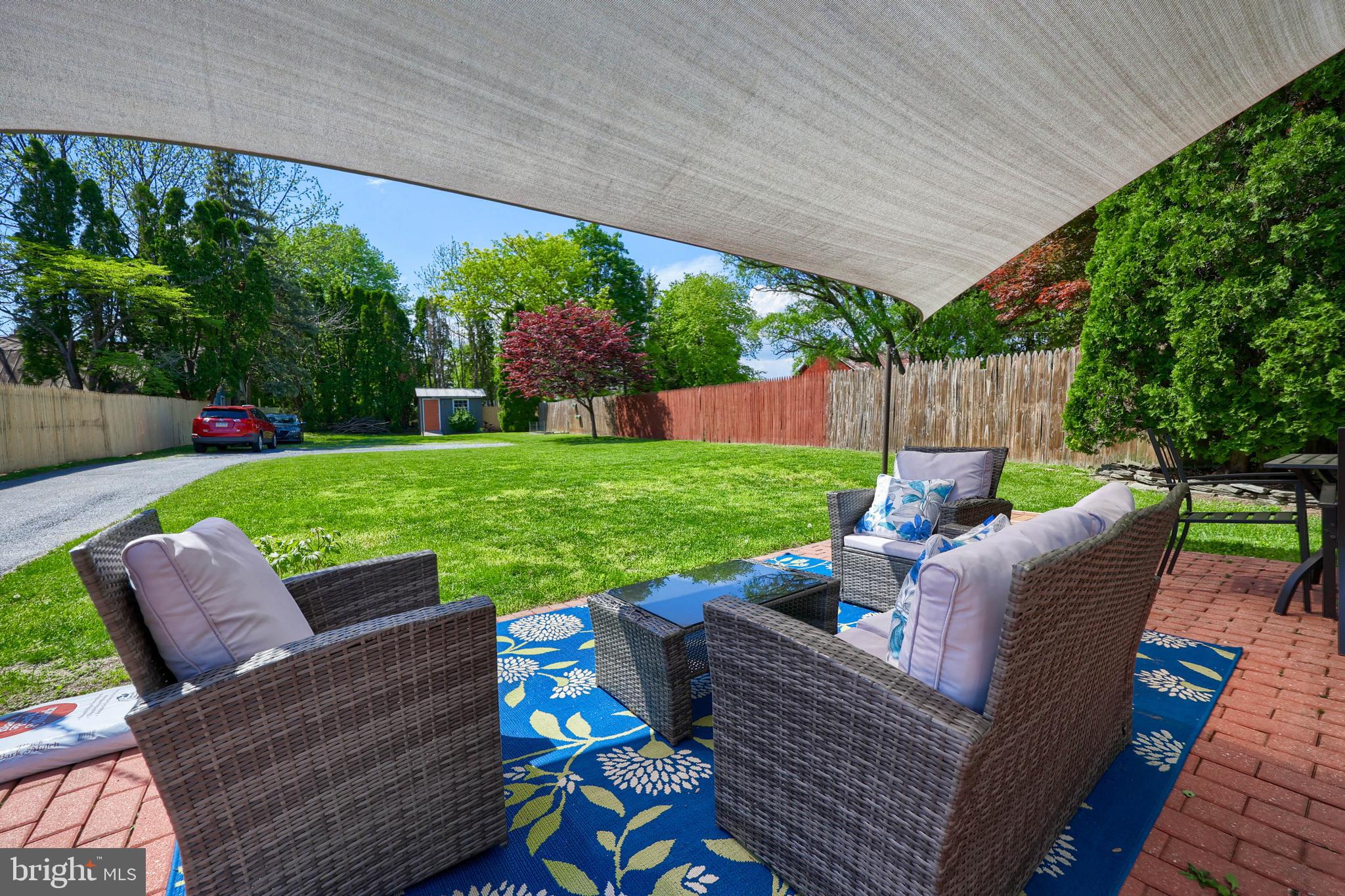 356 North Broad Street Lititz, PA 17543 - Photo 33 of 53 a view of a patio with couches chairs and a yard