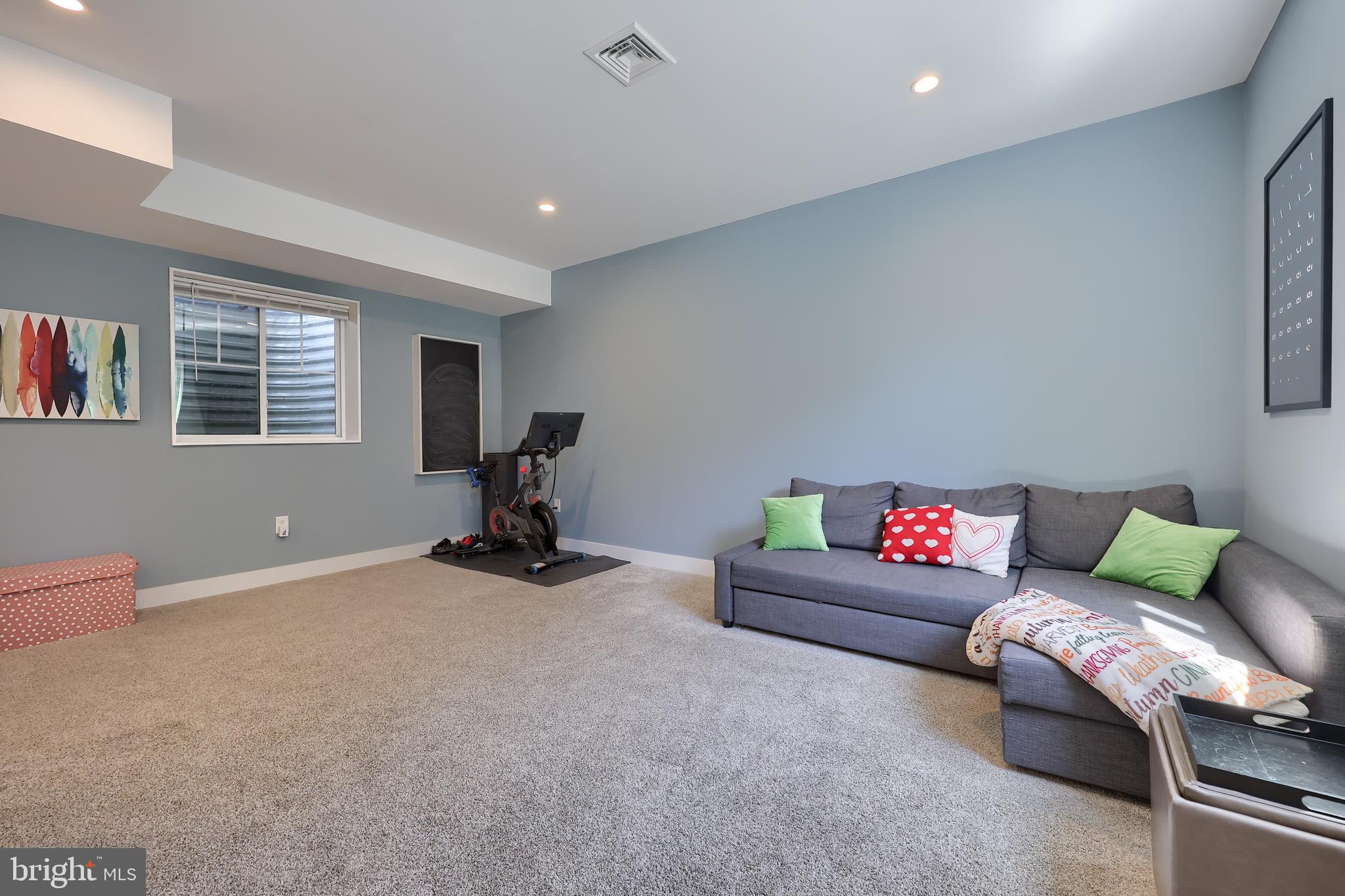356 North Broad Street Lititz, PA 17543 - Photo 51 of 53 a living room with furniture gym equipment and a window
